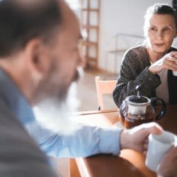 Older couple enjoying coffee together.