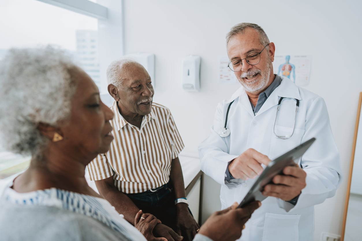 A couple attending an audiology appointment together.
